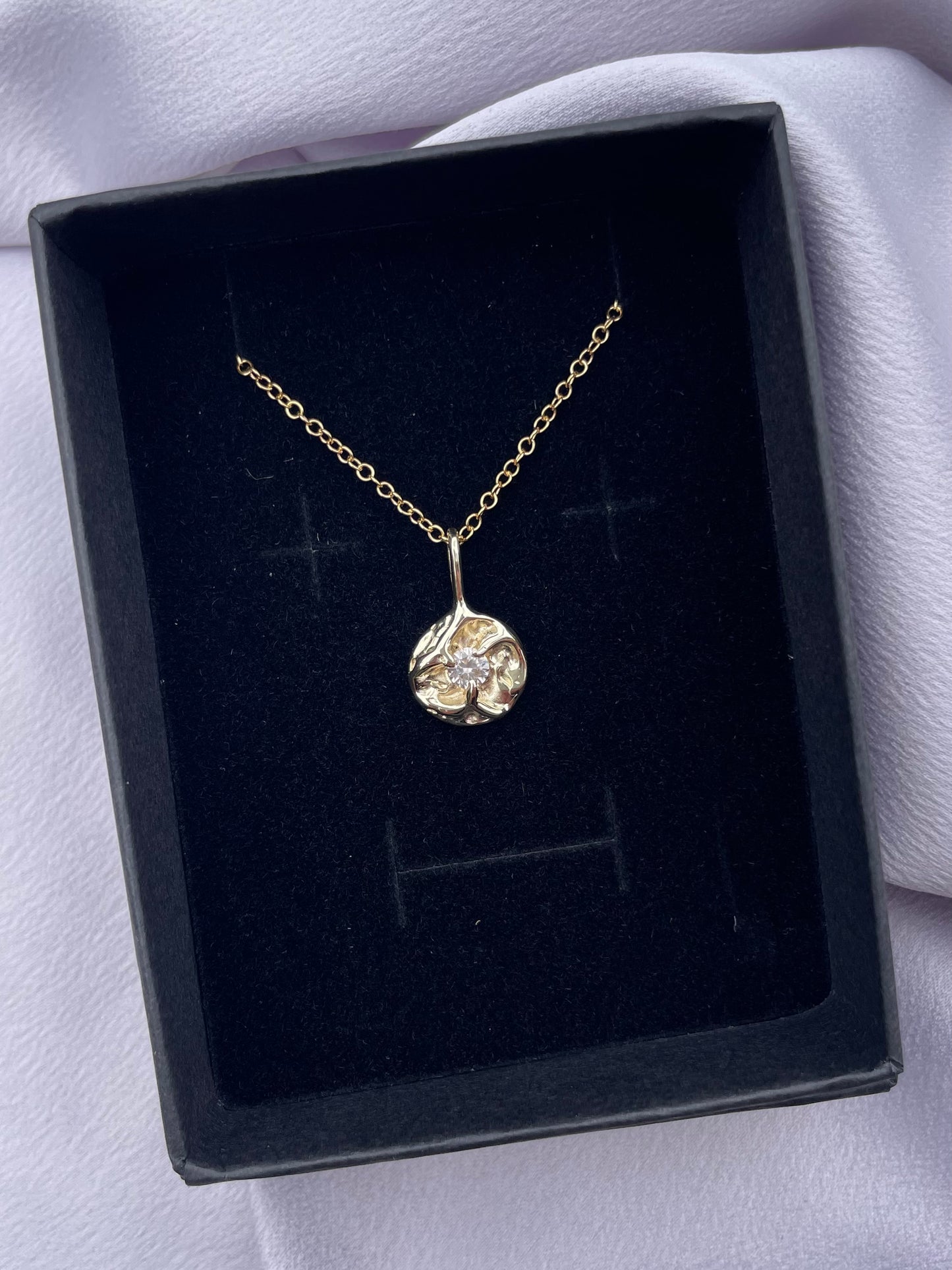 Tasmanian Zircon 9ct gold coin pendant